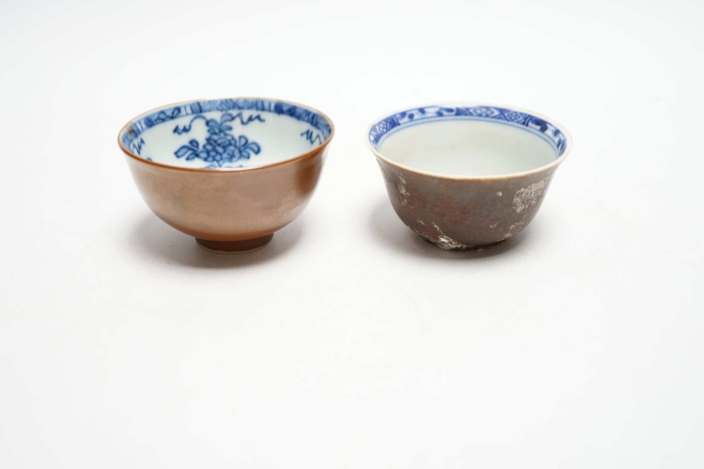 A Chinese Nanking cargo type tea bowl, another tea bowl and saucer, Qianlong period